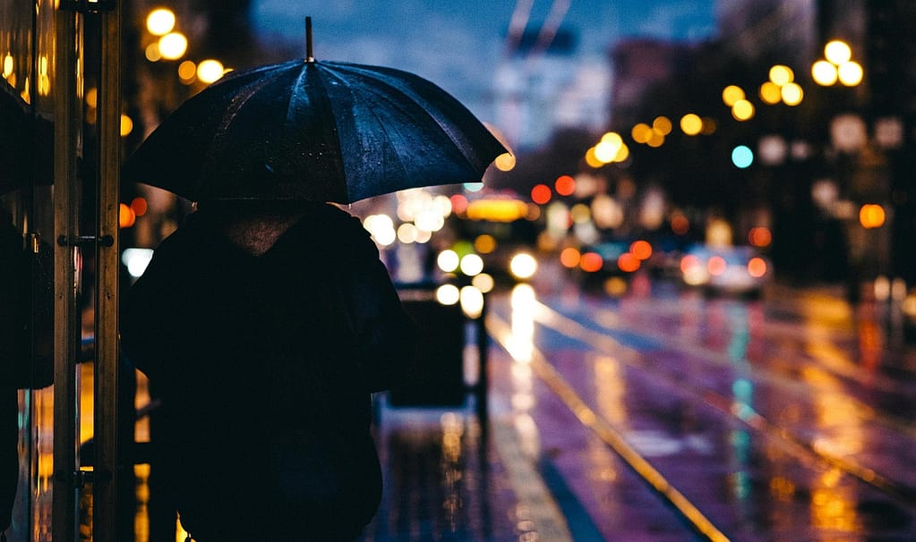 Landscape photography with bokeh showing artistic background highlights and soft artificial lights creating depth and color contrast.