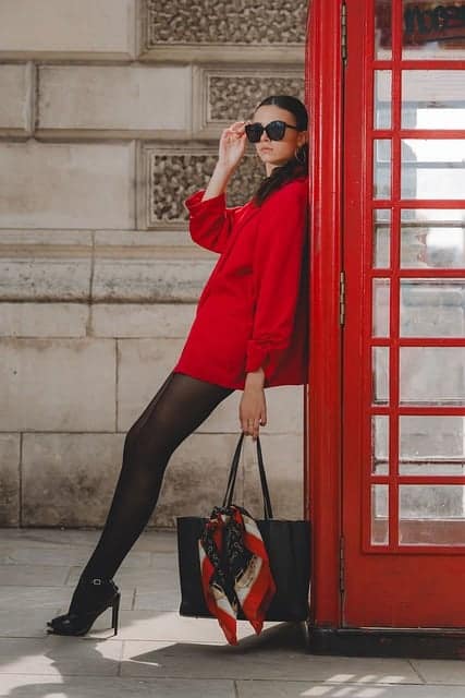 Girl standing on a London street with urban background