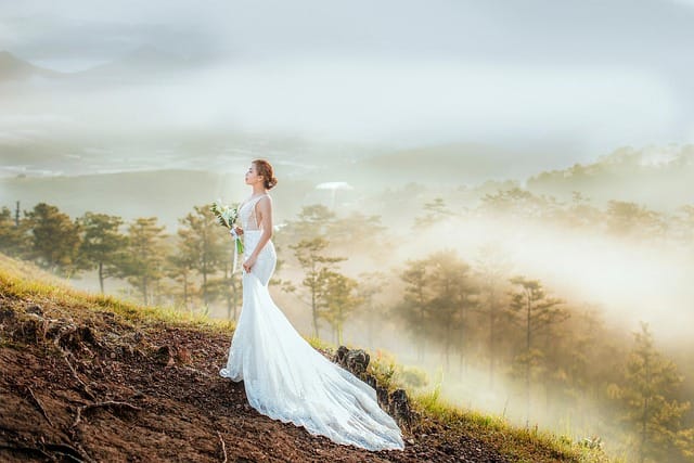 Bride and groom captured in elegant editorial style wedding photography with natural light and timeless composition