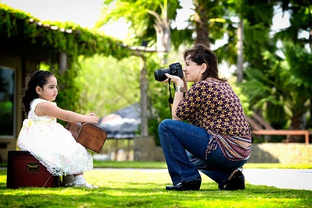 Fun and playful Mommy and Me photo shoot capturing laughter