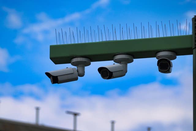 Outdoor 16 camera security system mounted for city surveillance under clear sky