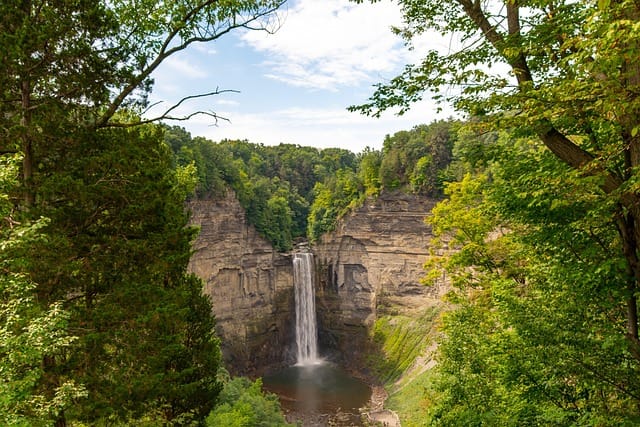 Beautiful Glen Oak Park waterfall surrounded by lush greenery – part of the Glen Oak Park photos collection in Peoria, Illinois